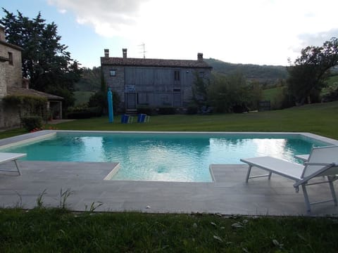 Seasonal outdoor pool, pool umbrellas, sun loungers