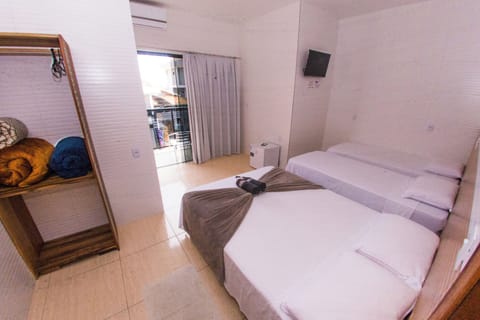 Standard Quadruple Room | Minibar, blackout drapes, iron/ironing board, free WiFi