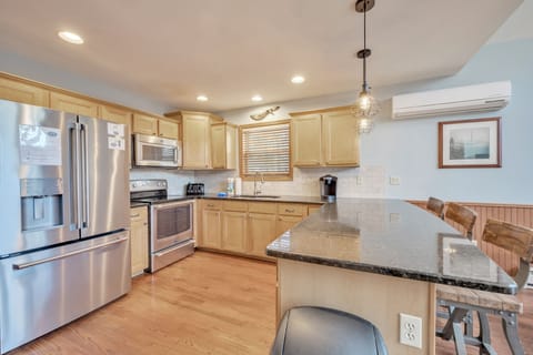 Be a Chef with this Modern Kitchen and Breakfast Bar with Seating.