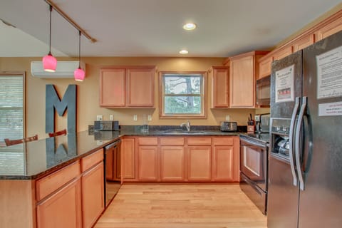kitchen with fridge and sink nearby