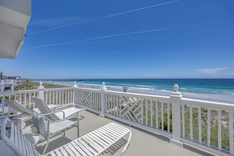 Relax on the private balcony with stunning ocean views, where gentle waves and endless blue skies create your perfect coastal retreat.