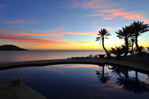 Pool with beautiful ocean view at sunset