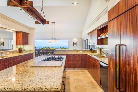 Kitchen Island with Cooktop, Dishwasher, and Refrigerator