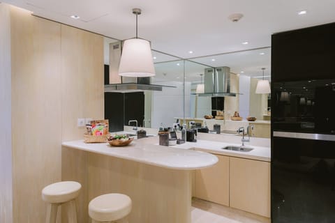 Family Apartment, 2 Bedrooms (Lagoon Pool Residence) | Private kitchenette | Coffee/tea maker, dining tables