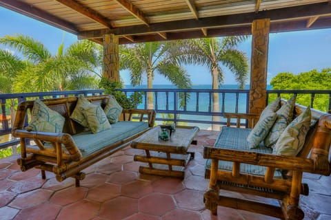 Lounge on the Breakfast Patio, with coffee, or cocktail, and stunning sea views