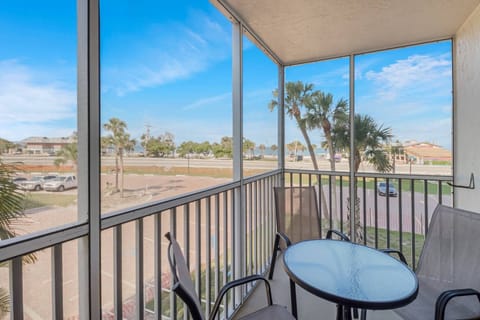 Enjoy sitting outdoors on your second floor lanai, with the Gulf in the distance.