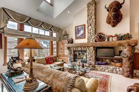 Living Room - Spacious Living Room with Lots of Natural Light, Wood Burning Fireplace