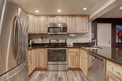 Nicely updated kitchen with stainless steel appliances.