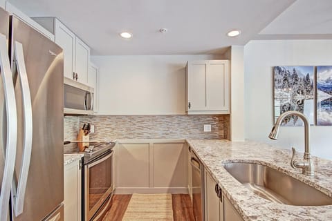 Beautifully updated kitchen with stainless steel appliances.