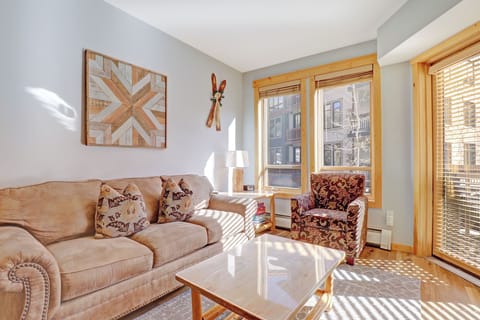 Step into your bright, welcoming living space where natural light dances through the windows, casting warm shadows across plush sofas perfect for your morning coffee or evening relaxation.