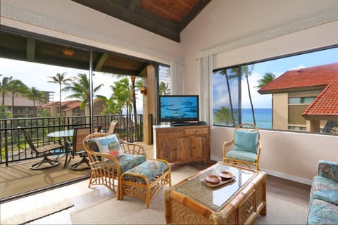 Living room with picture window out to the ocean.