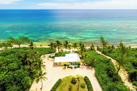 Aerial view of the home and beachfront. 