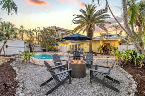 You'll love gathering around the fire pit as twilight wraps the sky in soft hues, the Adirondack chairs inviting conversations and cozy moments under the stars.