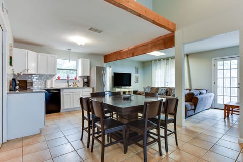 Full kitchen, dining and living space in the smaller house.