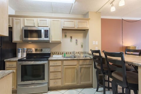 Our tiny kitchen packs a big bunch - our full-size appliances will get the job done! Buen provecho!