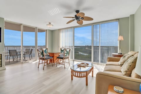 Floor to ceiling windows throughout the living area offer a stunning view and bring the natural beauty of southwest Florida into your vacation space.