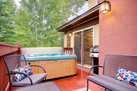 The patio is a nice place to relax, with a hot tub and a grill