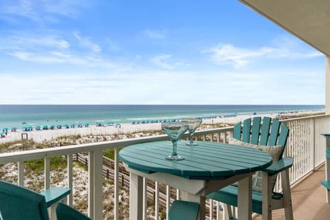 Balcony View - Balcony Bliss: Enjoy a beverage while soaking in stunning beach views from your private retreat!