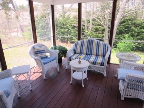 Screened in porch off of the dining area