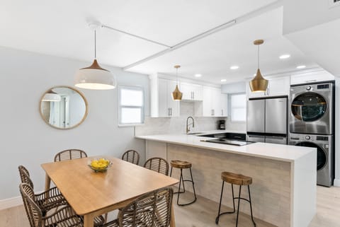 Bright dining area seats six