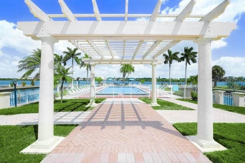 Walk down the courtyard to the bayside pool, right on the water
