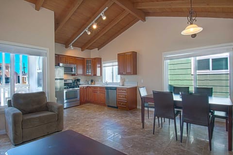 Inside photo showing kitchen & dining area