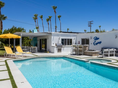 Resort-style yard made for relaxing in the sun