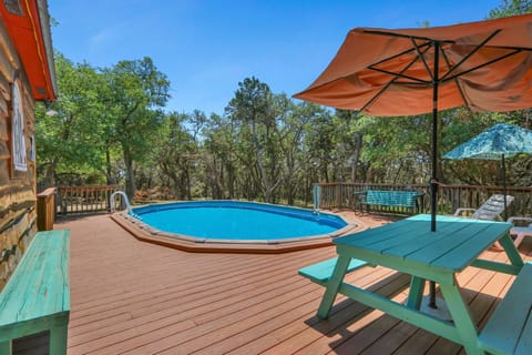 Private swimming pool with lounge seating
