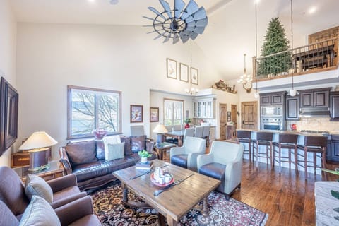The open floor plan is perfect for gathering - this is the living room, which is located on the main floor. It features comfortable furniture, gas fir
