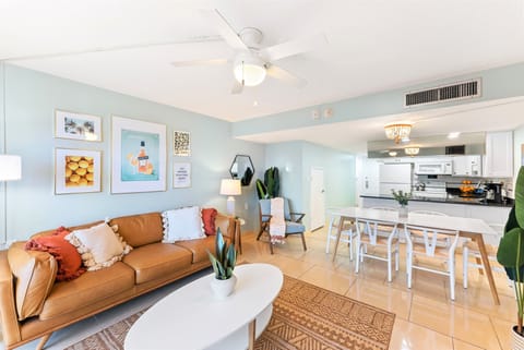 Spacious dining area with a high-top table, perfect for enjoying family meals.