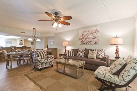 The inviting living area of our condo is a warm setting for families to catch up and enjoy time together.