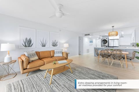 Bright and modern living room with a cozy, stylish touch—perfect for relaxation.