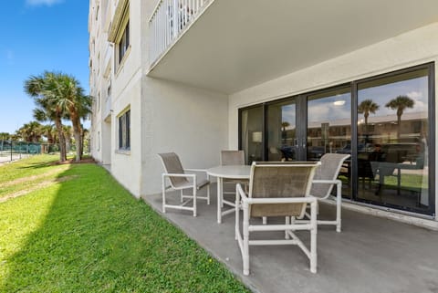 Start your day with coffee and sunshine from this ground-floor patio, complete with seating and views of the resort