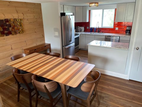 Dining area and full kitchen. - Dining area and full kitchen.