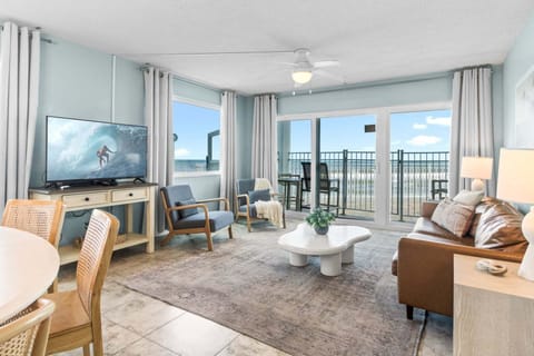 Unwind in a sunlit living space with breathtaking oceanfront views