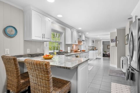 Kitchen with granite counter tops and stainless steel appliances - 4 Long Pond Drive Harwich Cape Cod - Cape Retreat - NEVR