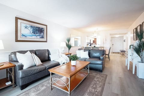 Inviting living room blends comfort and style with warm tones and soft lighting.