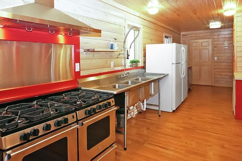 Commercial kitchen with two gas ranges