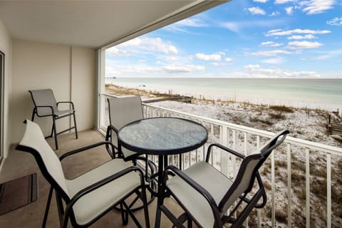 Balcony view - Enjoy a cocktail or meal right on your own private balcony surrounded by sand and surf!