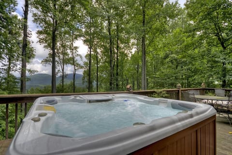 Soak in the Hot Tub with a beverage of your choice
