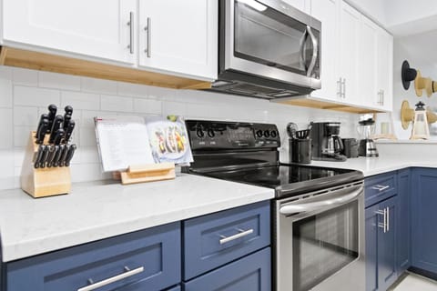 Spacious kitchen countertop and cooking essentials ready for your next meal.