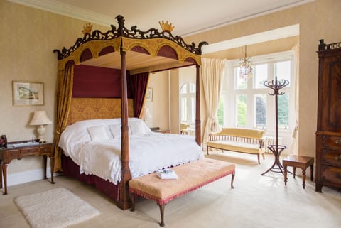 The stunning 'yellow room' bedroom is used as a bridal suite by our wedding couples