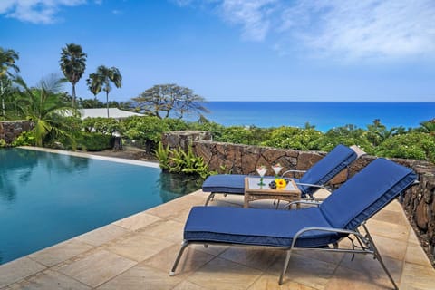 Pool Side Loungers with Ocean Views at Ailina House