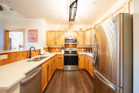 Updated full kitchen with stainless steel appliance and stock with essentials