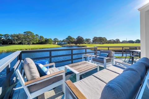 Enjoy Morning Coffee Or Evening Cocktails on The Expansive Deck