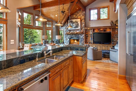 Spacious Gourmet Kitchen with Viking, Wolf and Sub Zero Appliances, Granite Counters, Bar Seating for 7