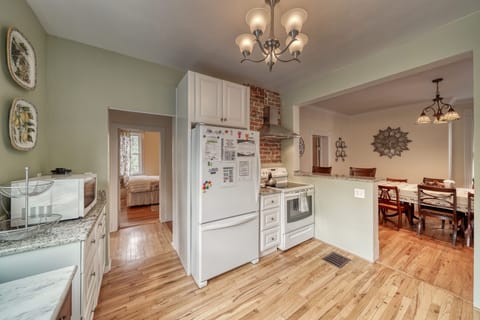Kitchen includes a dishwasher, full size refrigerator and full size stove.