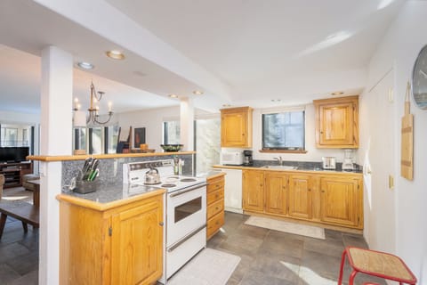 Enter into the open concept kitchen.
