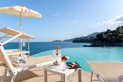 Seasonal outdoor pool, pool umbrellas, sun loungers