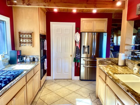 High End Kitchen with Brazilian Marble Counter Tops and Custom Made Cabinets.